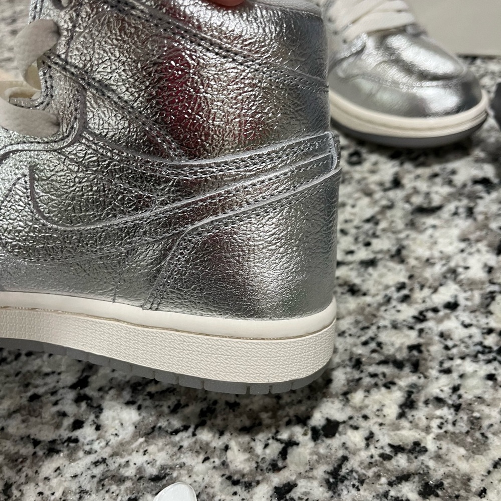 Only worn once.,They are too small!